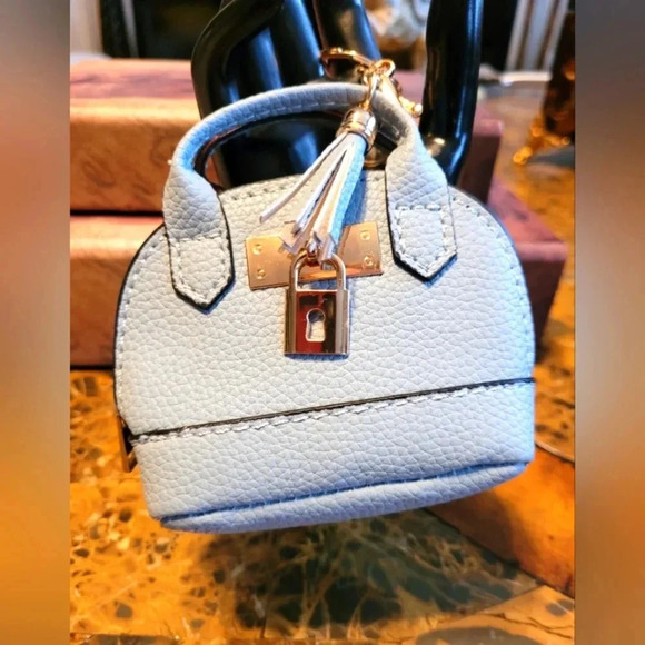 unbranded Handbags - Elegant Light Blue Mini Handbag iPad case